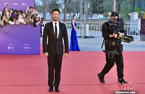 吳京亮相北京電影節。<a target=&apos;_blank&apos;  data-cke-saved-href=&apos;http://www.chinanews.com/&apos; href=&apos;http://www.chinanews.com/&apos; ><p  align=